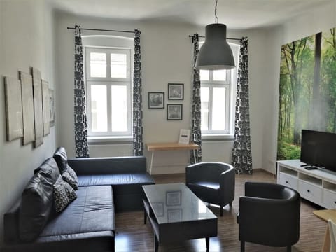 Welcome to the living room, the heart of your home, where Arbio Designers have curated a space for relaxation and togetherness.