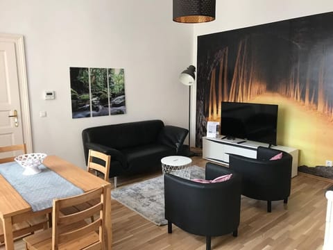 Welcome to the living room, the heart of your home, where Arbio Designers have curated a space for relaxation and togetherness.