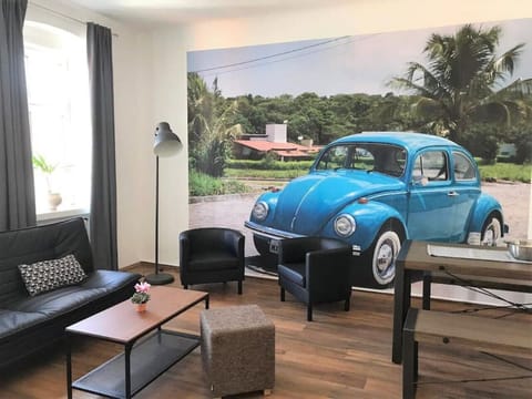 Welcome to the living room, the heart of your home, where Arbio Designers have curated a space for relaxation and togetherness.
