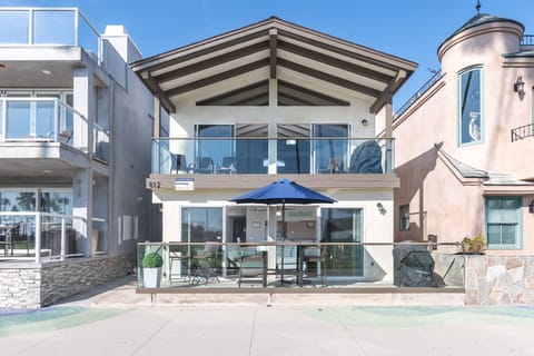 Oceanfront retreat in Newport Beach, offering both the ground-floor and upper-level residences
                