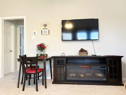 Living room with Smart TV and electric fireplace