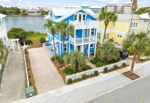 Coastal vacation home with tropical landscaping and waterfront location near beaches and local attractions.