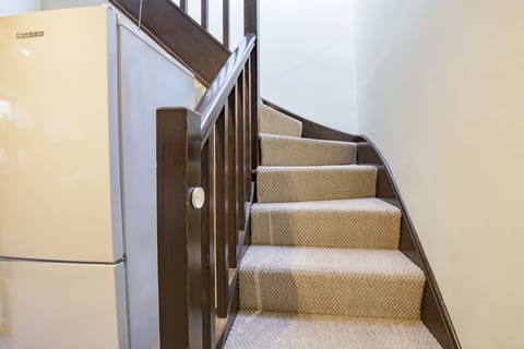 Stairs leading to the first floor