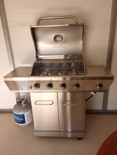 Propane grill located in mancave