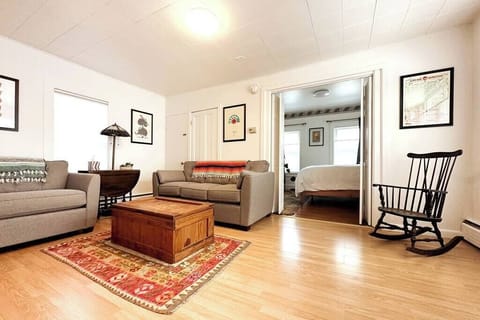 A bright and spacious living room has everything perfectly in place for board games or movie nights