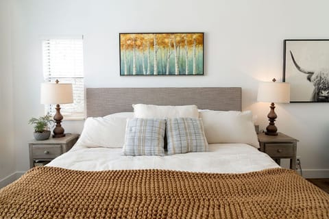 Master King bedroom with feather duvet cover. 