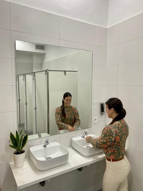 Basic Shared Dormitory, 1 Double Bed | Bathroom | Shower, hair dryer, soap, shampoo