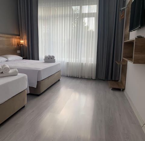 Standard Triple Room | Premium bedding, minibar, soundproofing, iron/ironing board