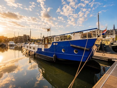 Our 1916 Dutch barge moored at St Katharine Docks, minutes from Tower Bridge