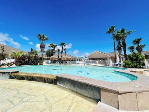 Shallow area for kids with a fun splash pad feature.