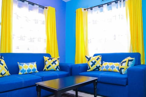 Comfort Apartment | Living area | 43-inch Smart TV with digital channels, Netflix, streaming services