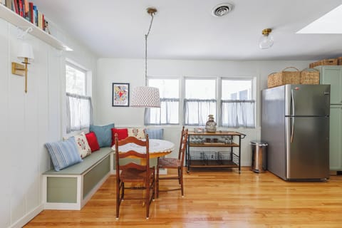 Cottage style kitchen with charming breakfast nook
