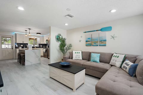 Open living room, kitchen, and dining area.
It's bringing everybody together.