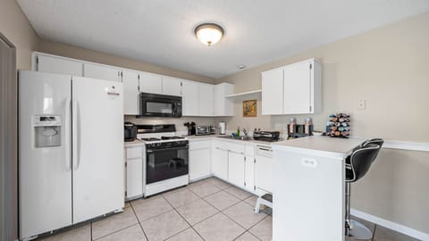 Full Size Fridge/Freezer w/ice/water, coffee station, tea, glasses, dishes