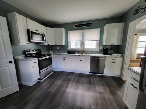 Newly updated kitchen. Main bathroom is off kitchen.