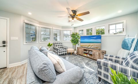 Bright Coastal Living Room with Bay Windows
