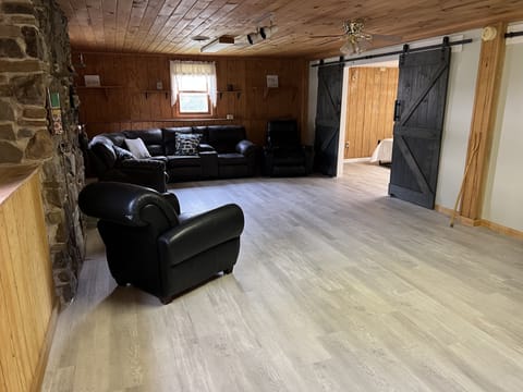 Panoramic Duplex | Living area | 65-inch flat-screen TV with digital channels