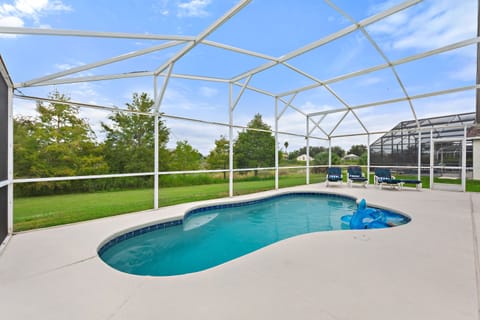 Private swimming pool with conservation oasis