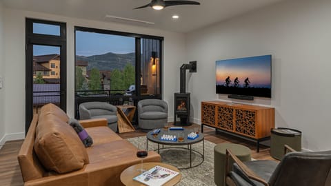 Great Room, Main Level - With gas fireplace and views