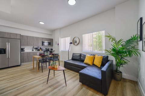 City Apartment | Living area | 50-inch Smart TV with cable channels