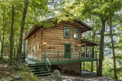 Grandpa Dans Cabin perched above the river