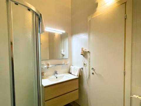 Family Suite | Bathroom | Rainfall showerhead, hair dryer, bidet, towels