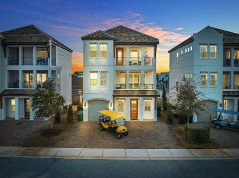6-seat Golf Cart FREE during your stay! 2 minutes to the beach. Sleeps 15, 6 bedrooms, 5.5 bath, and 10 beds. Game room and bunk rooms. Heated pool across from the house!