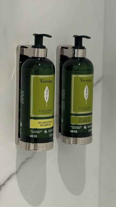 Hair dryer, slippers, towels, soap