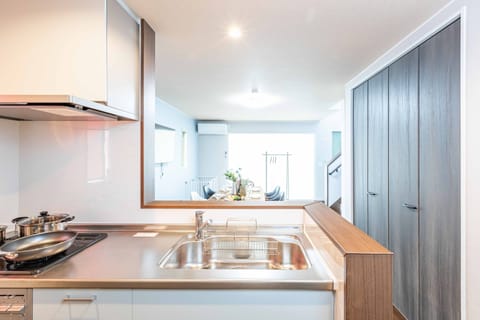 Comfort Villa | Private kitchen | Full-size fridge, microwave, stovetop, electric kettle