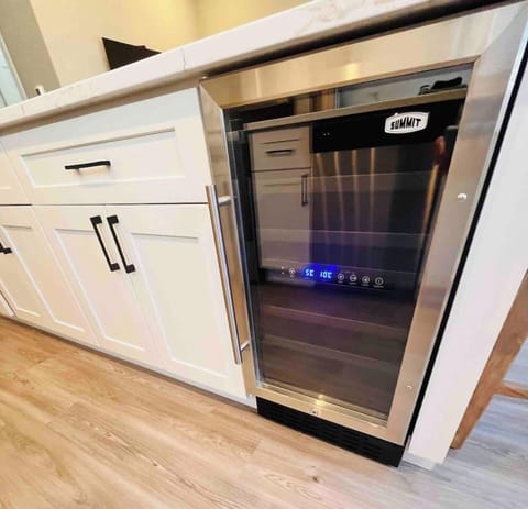 Enjoy the dual zone wine fridge.