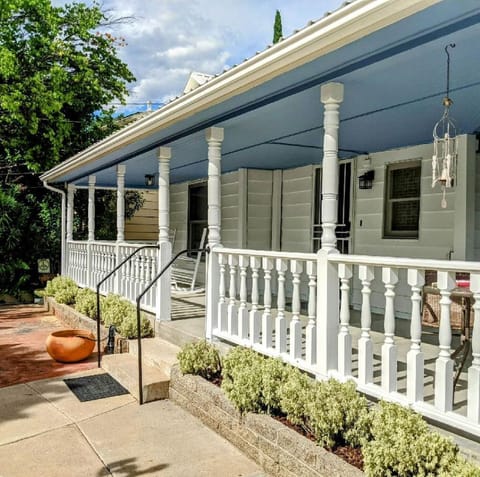 Entrance to home. Wraparound porch.  Great place to enjoy that first cup of Joe.