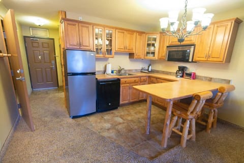 Kitchen area, looking toward the front door