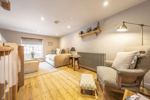 12 Station Road, Holt: Tranquil sitting room with comfortable seating