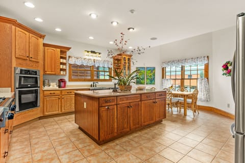 Fully stocked kitchen with pots, pans, plates, silverware and more. 