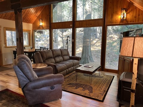 Large windows to view the wooded lot