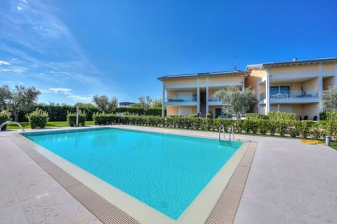 Family Apartment, Multiple Bedrooms (Una Meta Tra Gli Ulivi) | Pool | Seasonal outdoor pool