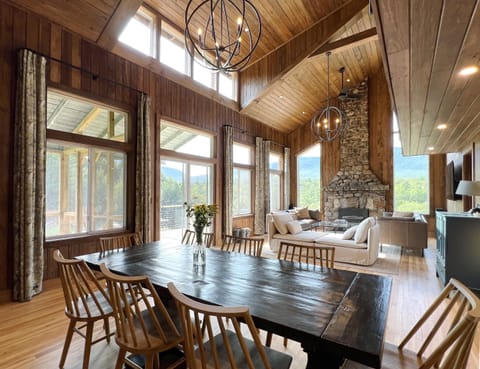 River Ridge Camp’s great room boasts stunning views of the Stephenson Range, with a vaulted, open living plan connecting indoor and outdoor living.