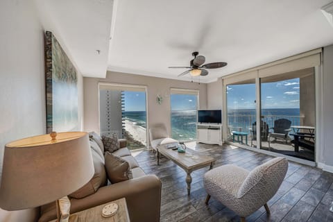 The tastefully decorated living room offers ample, comfortable and NEW seating, flat screen television, and floor-to-ceiling Gulf views. There is also a sliding door to access the unit's private balcony.