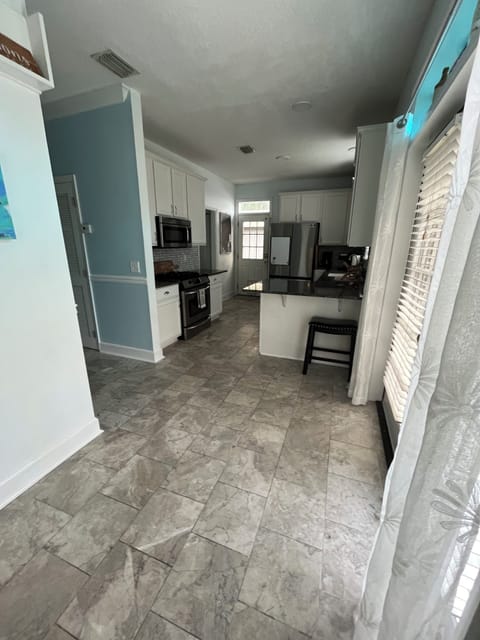 Entrance from dining area into kitchen