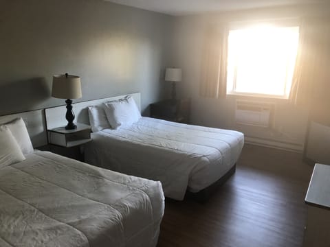 Room, 2 Double Beds | Laptop workspace, iron/ironing board, bed sheets