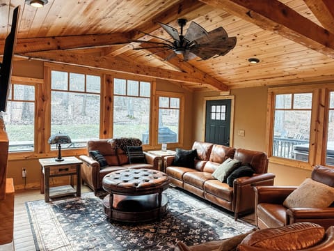 This great room features brand new leather furniture, expansive windows, and a rustic stone fireplace with gas insert. This room flows right into the kitchen so it's an easy spot for everyone to gather.
