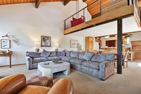 Comfortable Living Room Looking Toward the Dining Area and Kitchen