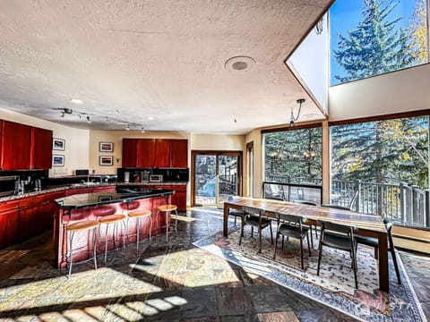 Feast in sunlit splendor, overlooking tranquil mountain evergreens.