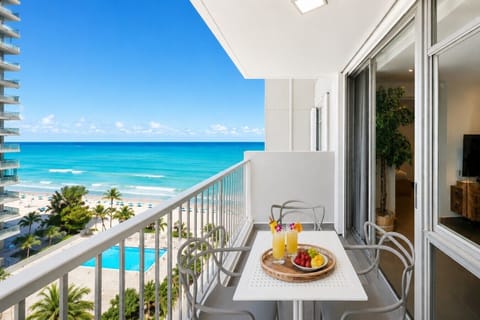 Private balcony with seating and refreshing ocean views