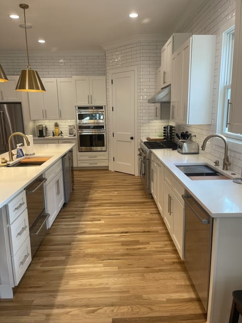 Kitchen with dedicated icemaker, multiple dishwashers, beverage fridge
