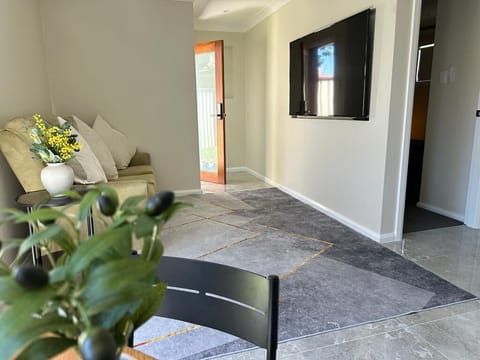 Family Villa | Living area | Flat-screen TV