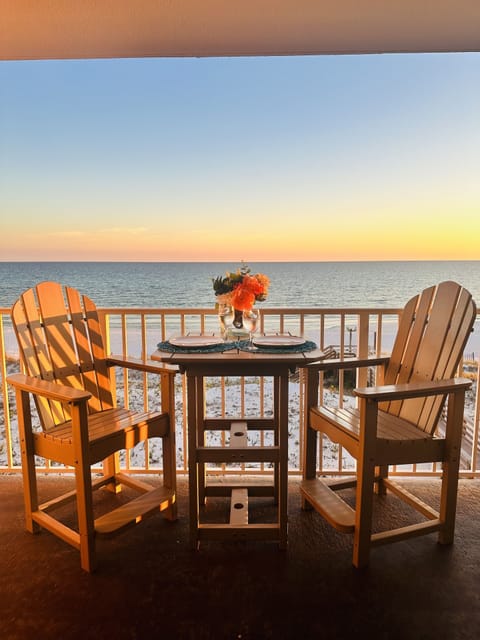 Beautiful gulf front balcony with comfortable furniture