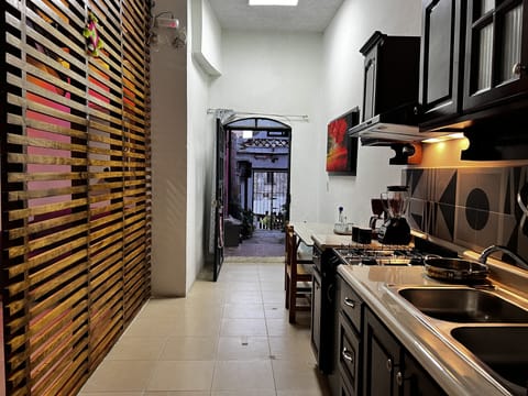 Executive Suite, 1 King Bed | Private kitchen | Shared fridge, microwave