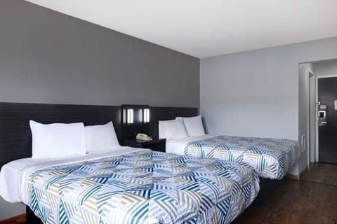 Laptop workspace, free WiFi, bed sheets