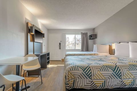 Deluxe Room, 2 Queen Beds, Refrigerator | Free WiFi, bed sheets